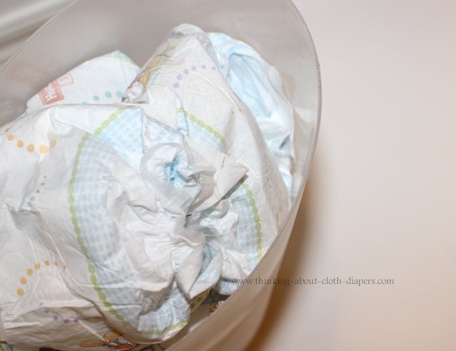 disposable diapers in trash can.