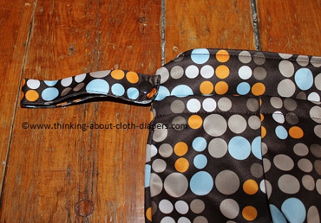 funky fluff wet bag with snap on strap