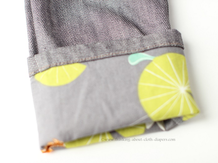 Roll-up cuffs on baby Project Pomona Jeans feature contrast fabric - grey Little Hipster with Koi fabric