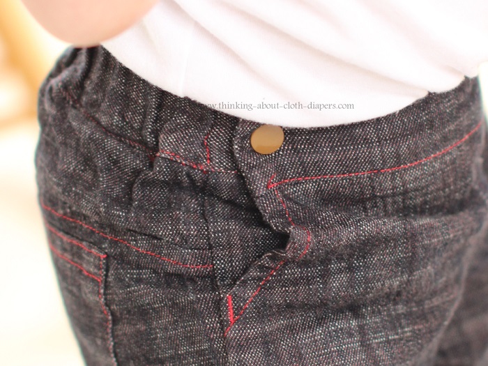 up close of front panel and pocket detail on Project Pomona jeans